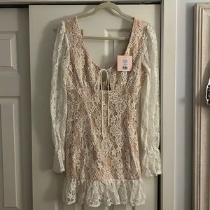 Showpo Tie Front Long Sleeve Mini Dress